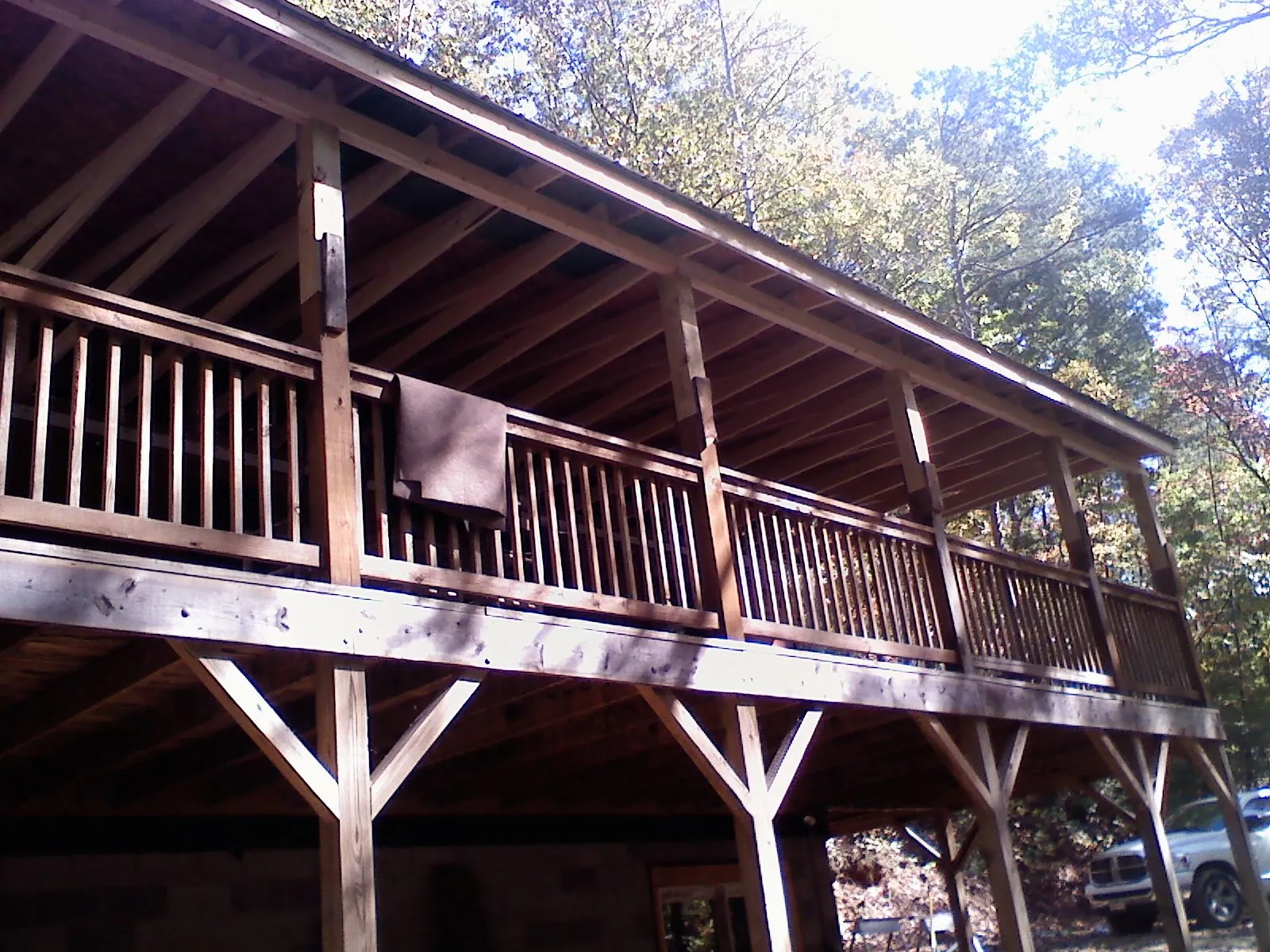 Timber framing under a new elevated porch and deck — Roof Leak Repair in Dorset by Roofing Brothers